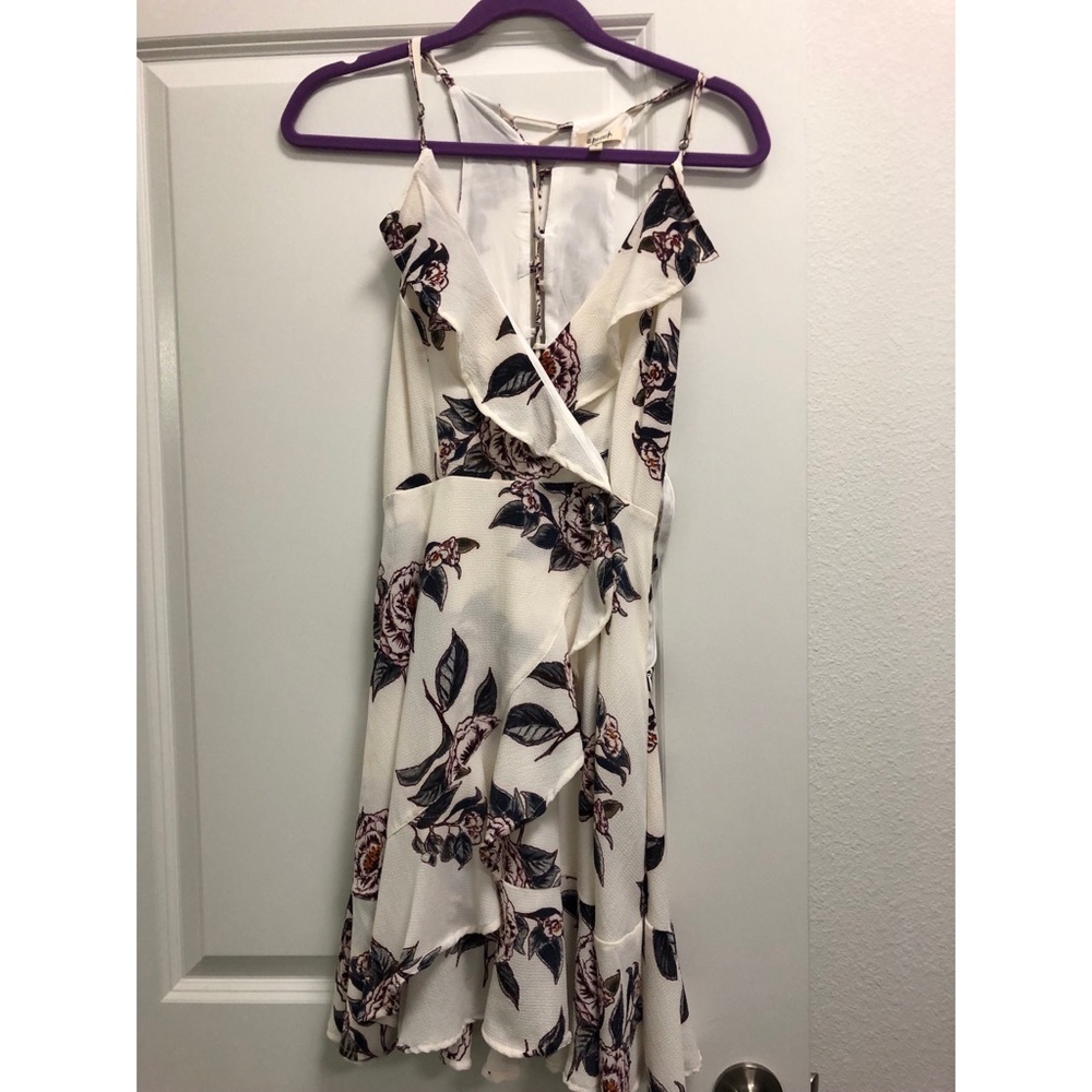 Fit and flare dress with ruffle trim and detail